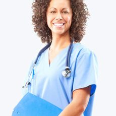 Smiling female nurse holding a clipboard.