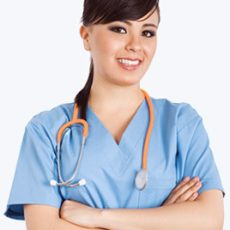 Smiling female doctor in scrubs with stethoscope.