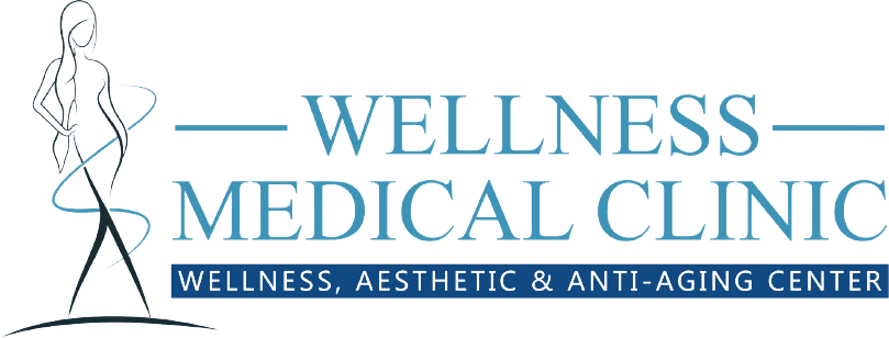 A logo for a medical center with the words " wellness medical group ".