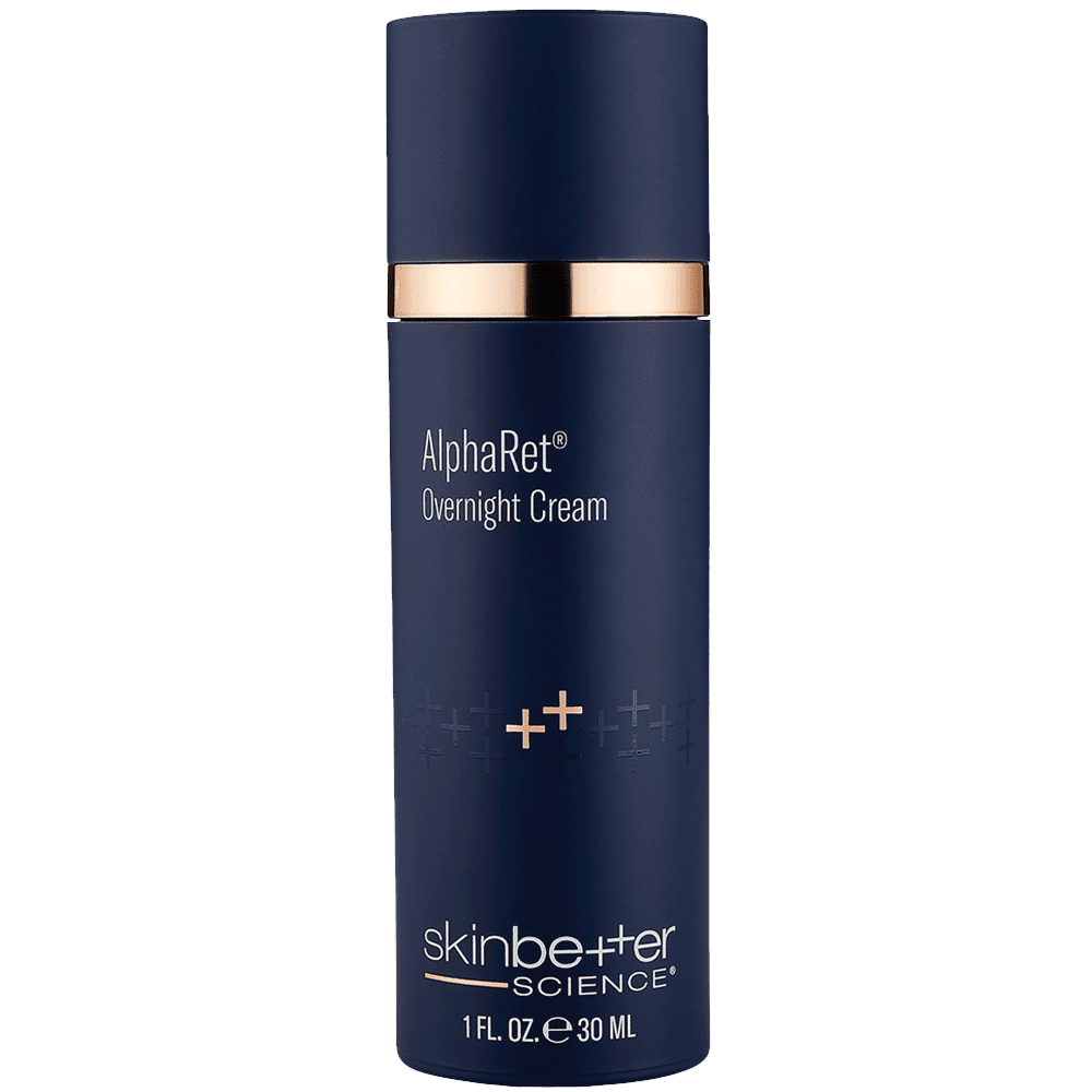 A bottle of skin better overnight cream on a green background