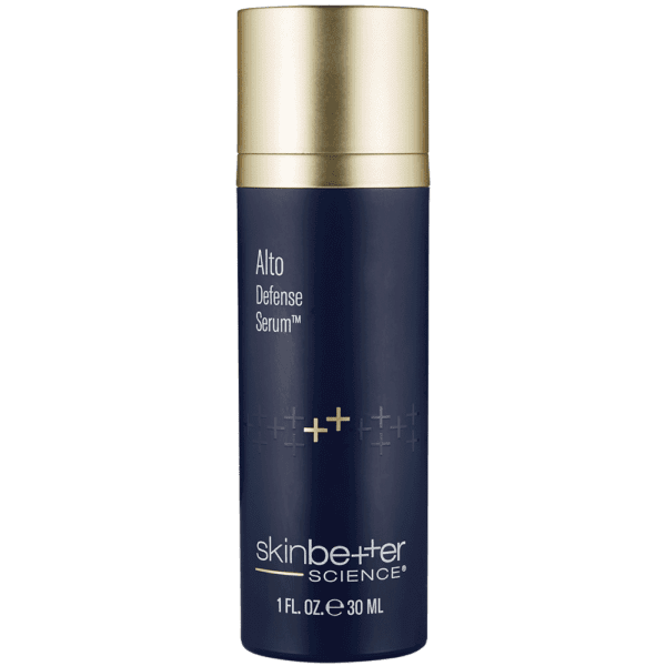 A bottle of skin energy serum on a green background.