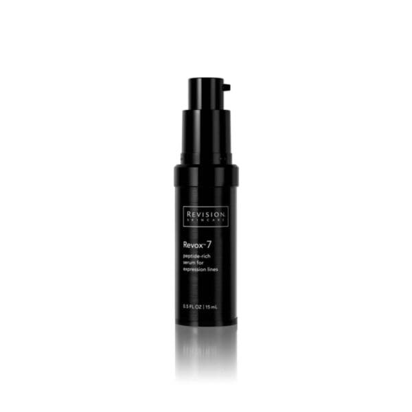 A bottle of Revox 7 anti-aging serum on a white background.